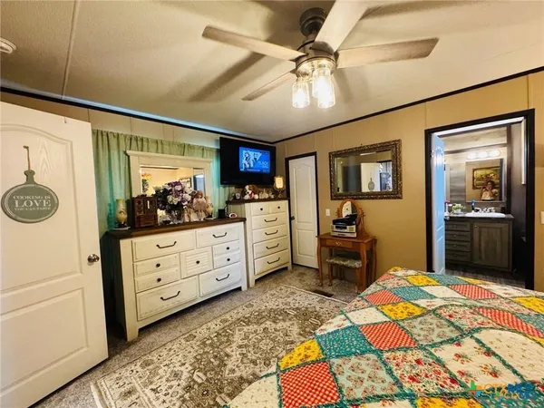 a bathroom with a tub and sink