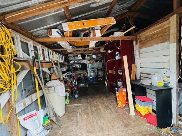 a view of a back yard of the house