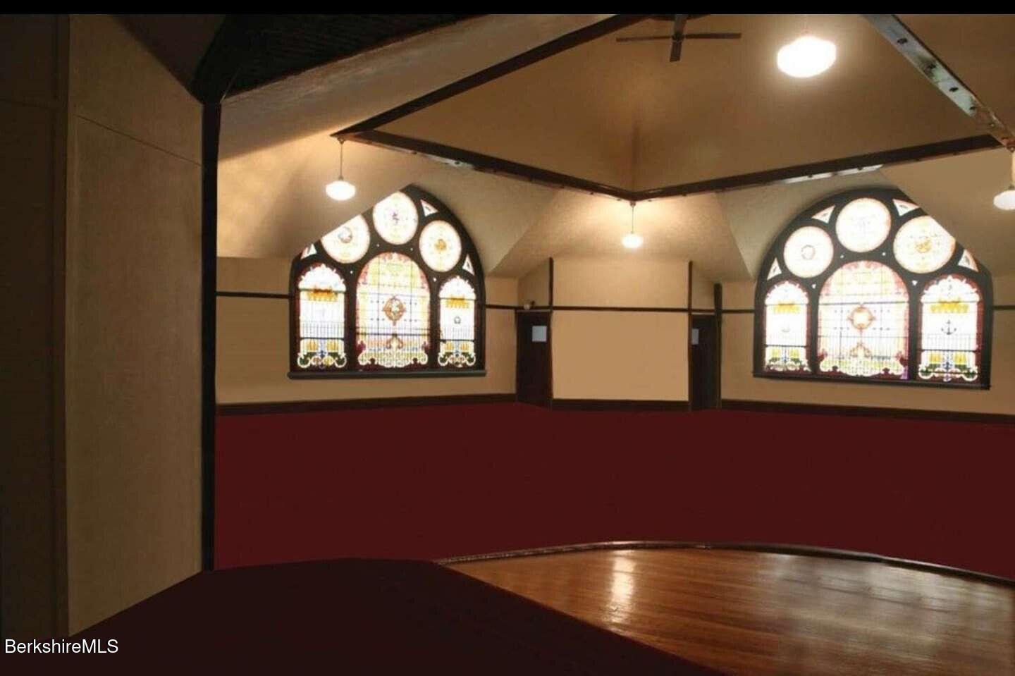 160 High Street Lee, MA 01238 - Photo 40 of 41 an empty room with wooden floor and windows