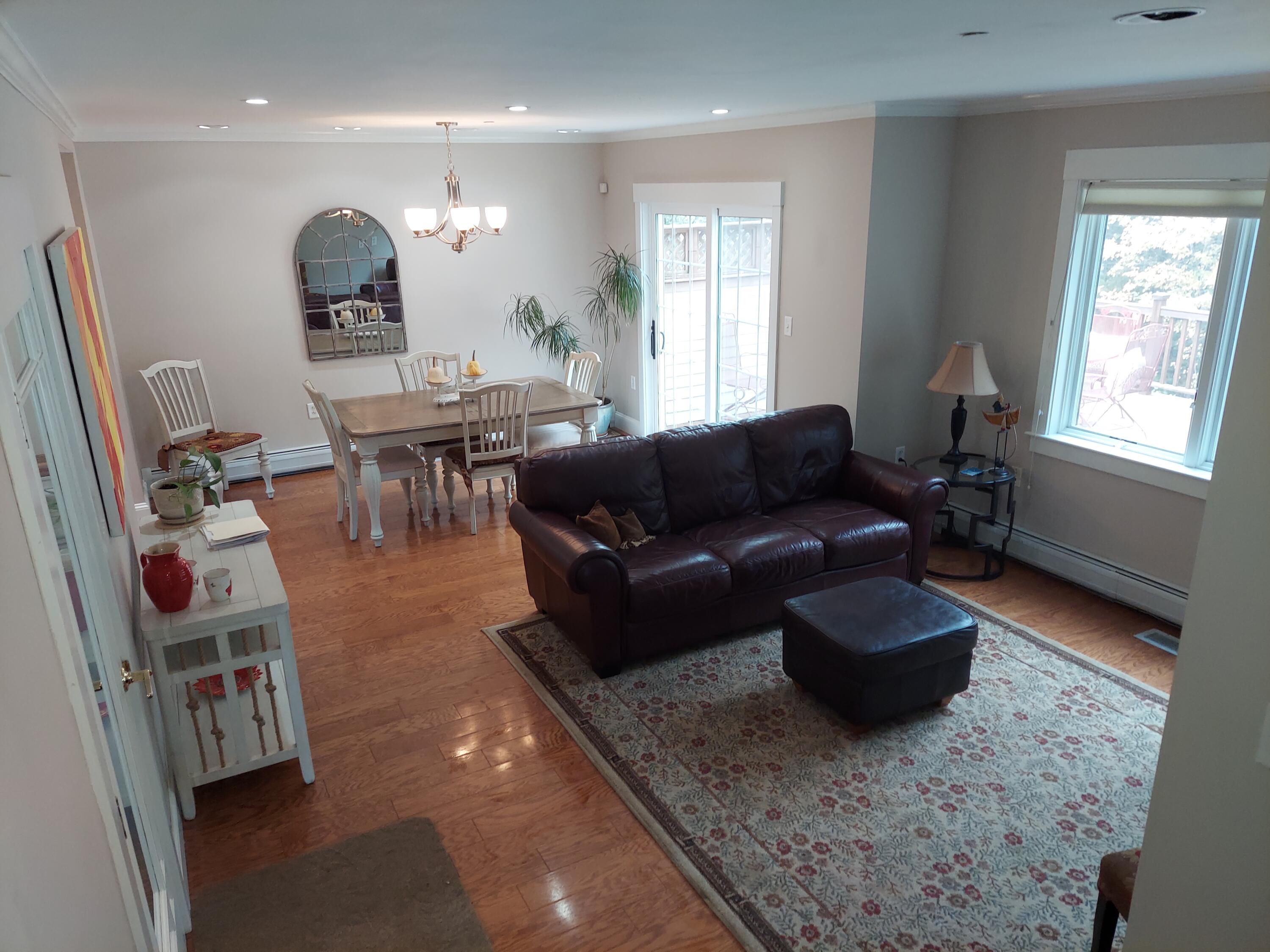 32 Springbrook Drive, Unit B Belfast, ME 04915 - Photo 21 of 41 Living room and dinning area