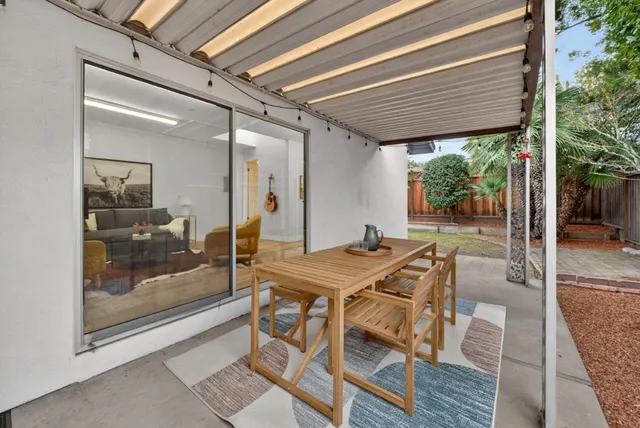 a view of an outdoor space with furniture