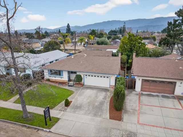 an aerial view of a house with garden