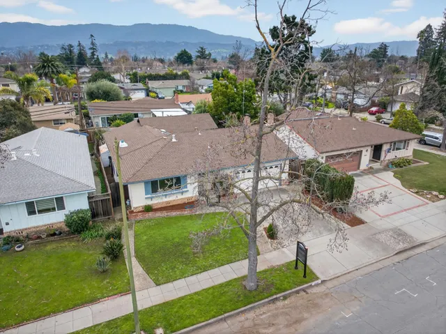 a view of a house with a garden