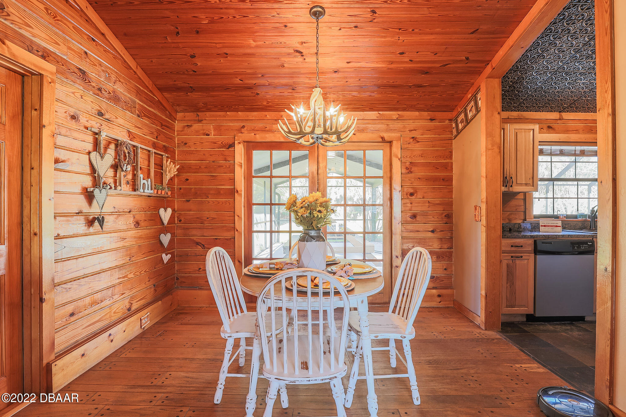 114 Pine Creek Court Ormond Beach, FL 32174 - Photo 11 of 41 a view of a dining room with furniture and window