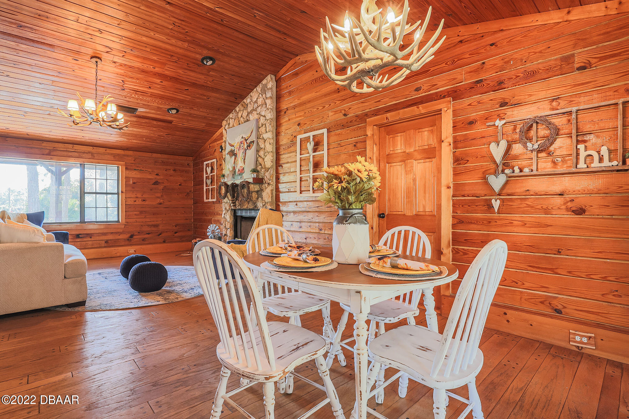 114 Pine Creek Court Ormond Beach, FL 32174 - Photo 12 of 41 a dining room with furniture and wooden floor