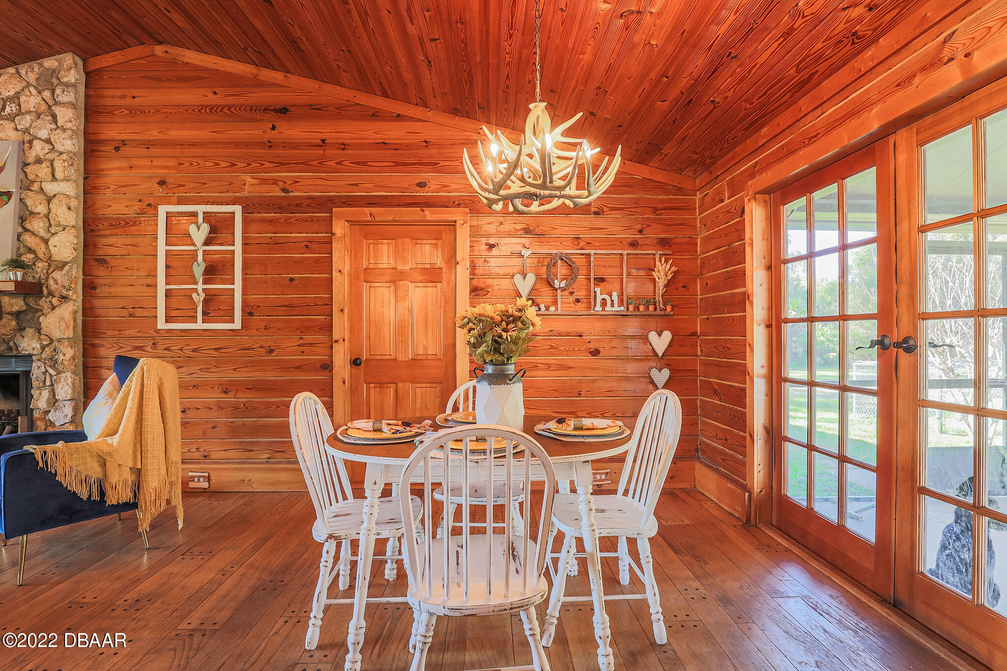 114 Pine Creek Court Ormond Beach, FL 32174 - Photo 13 of 41 a view of a dining room with furniture and wooden floor