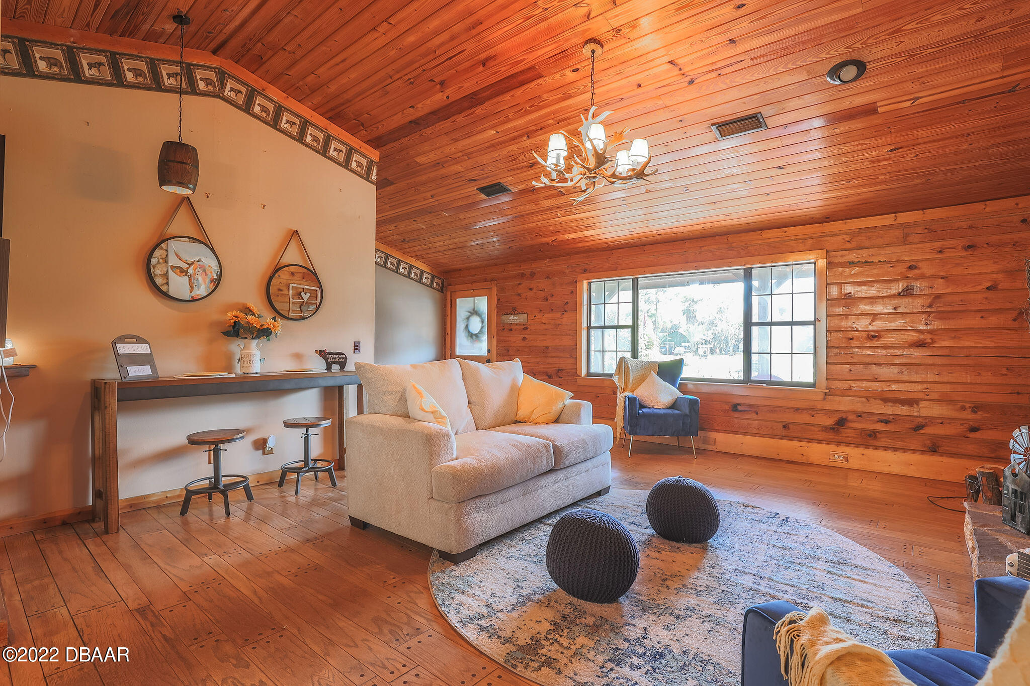 114 Pine Creek Court Ormond Beach, FL 32174 - Photo 6 of 41 a living room with furniture and a large window