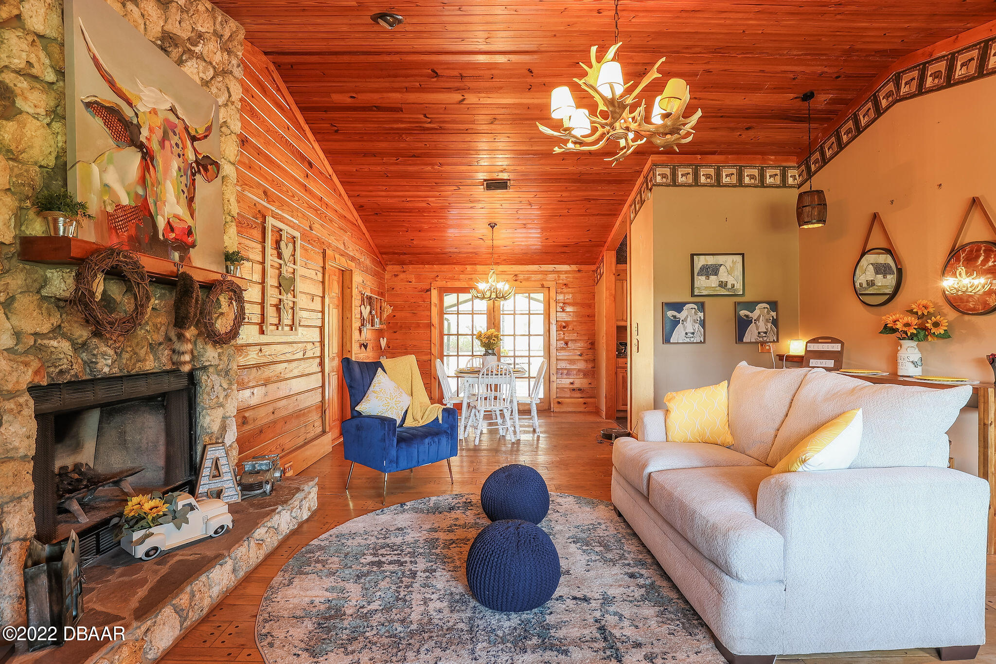 114 Pine Creek Court Ormond Beach, FL 32174 - Photo 8 of 41 a living room with furniture and a fireplace