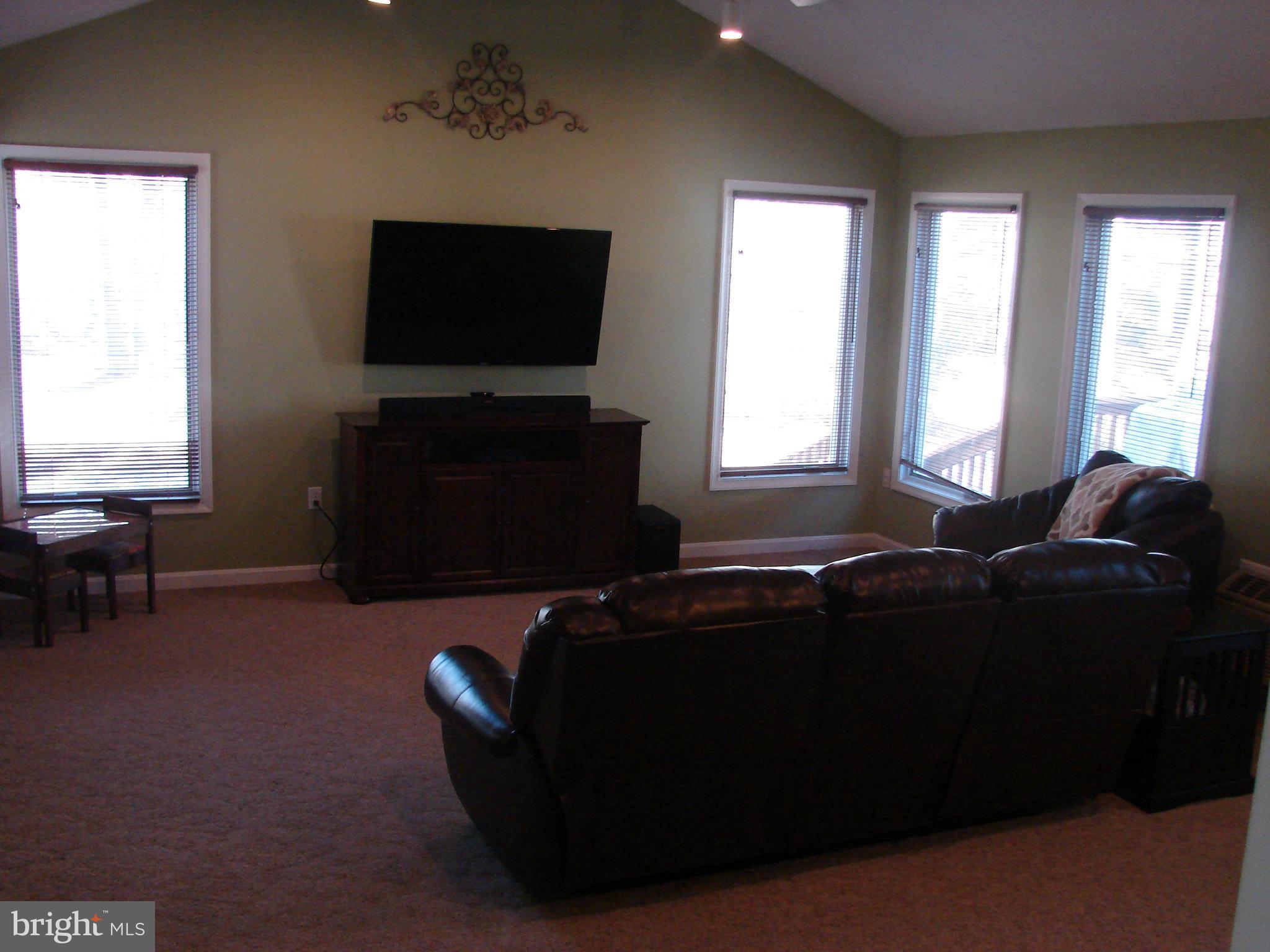 988 Johnswoods Road Lusby, MD 20657 - Photo 15 of 28 Watch TV while watching the backyard or deck