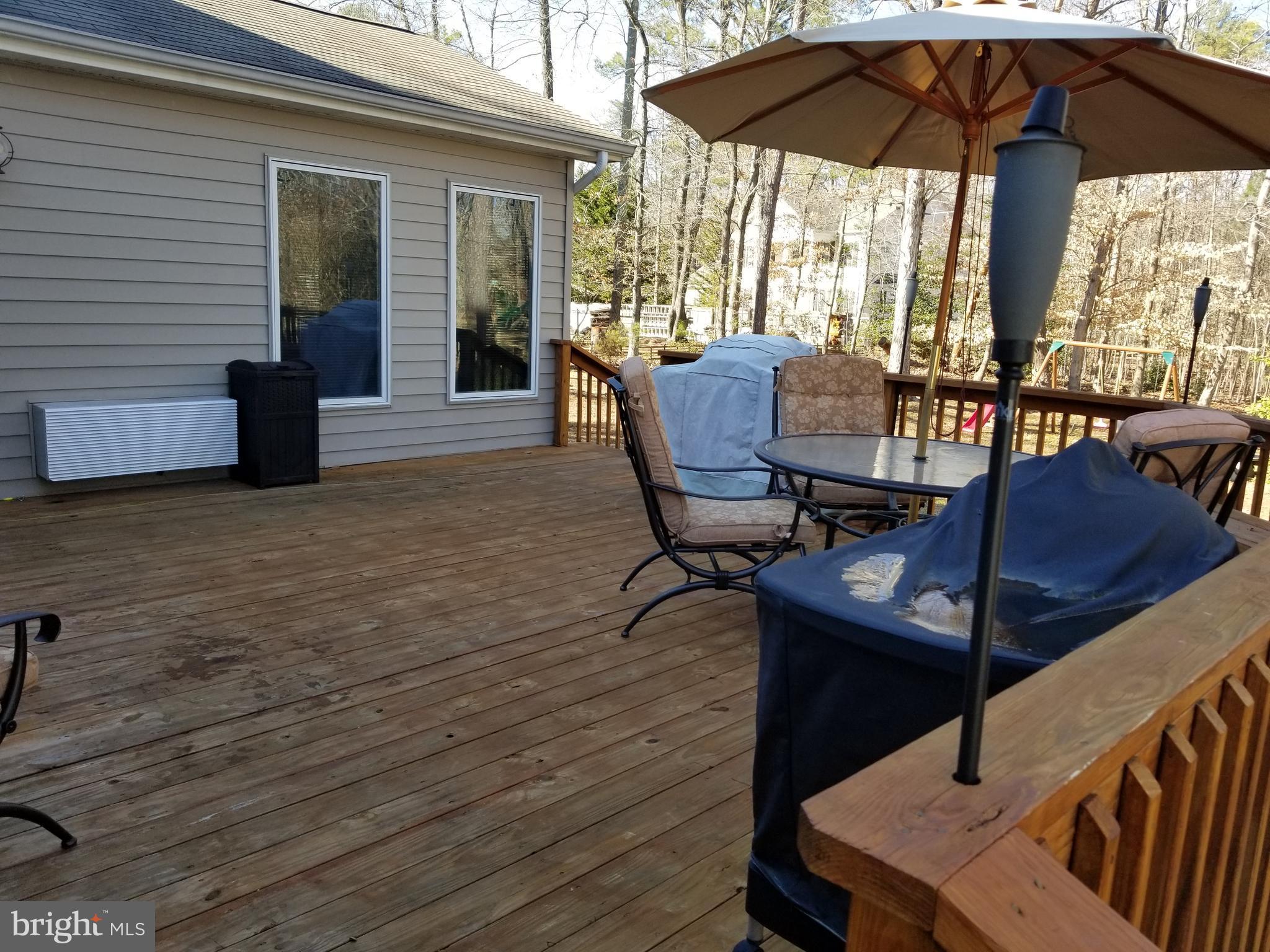 988 Johnswoods Road Lusby, MD 20657 - Photo 25 of 28 Sitting area on the deck