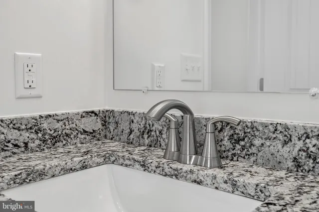 a close view of a sink in a bathroom