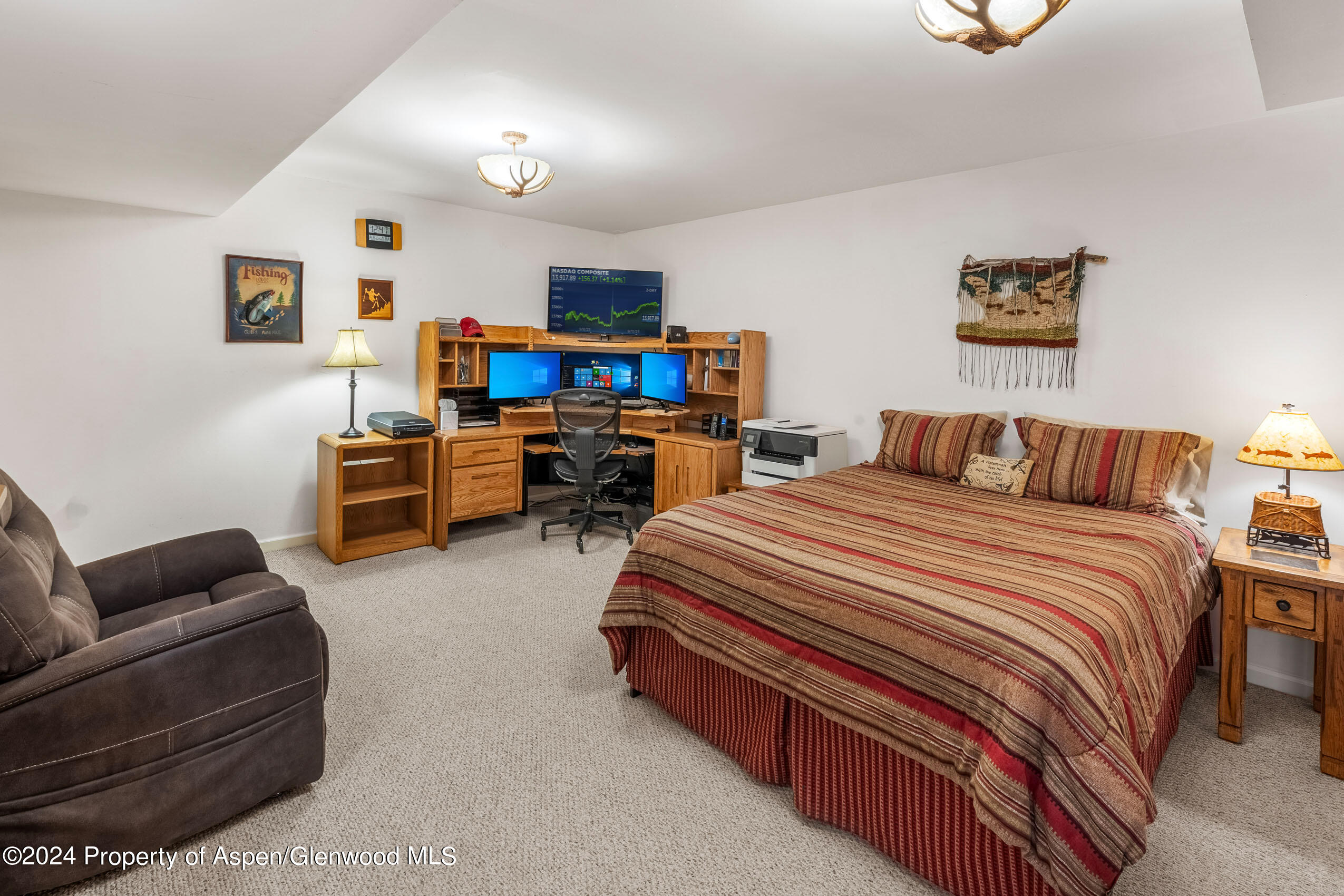 299 Knight Road Basalt, CO 81621 - Photo 16 of 48 a bedroom with bed and window