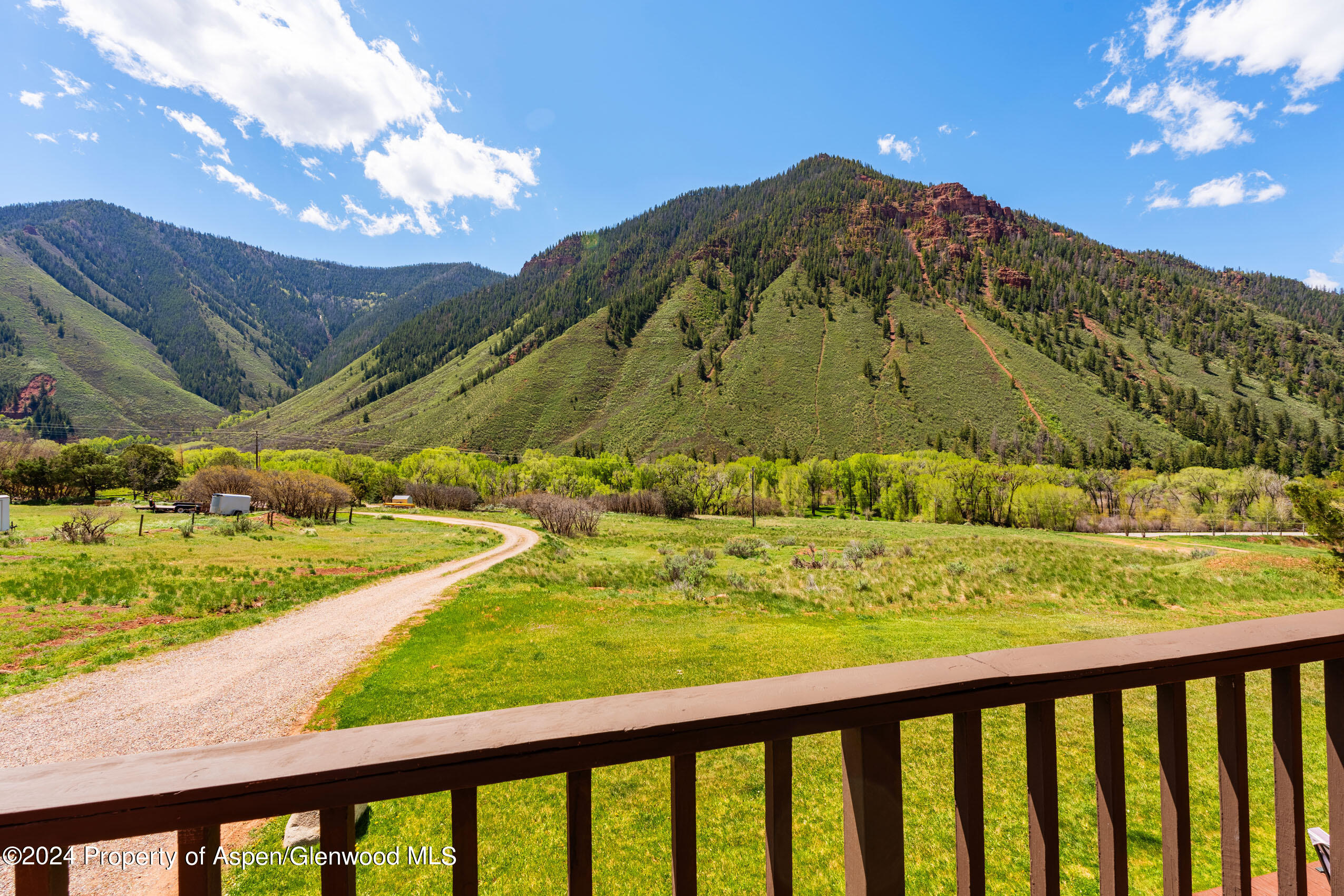 299 Knight Road Basalt, CO 81621 - Photo 19 of 48 a view of a swimming pool with a yard