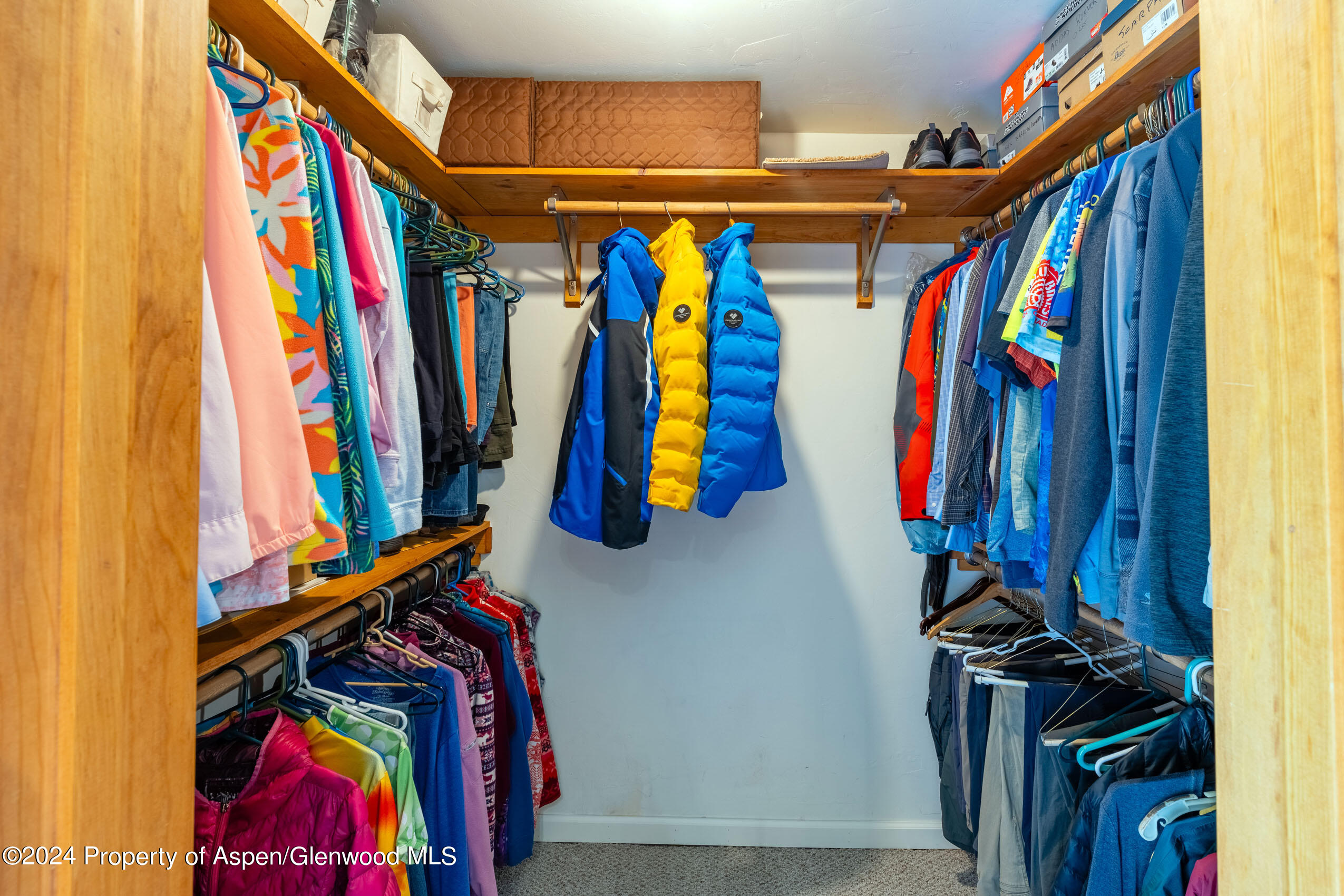 299 Knight Road Basalt, CO 81621 - Photo 21 of 48 a view of walk in closet with clothes and shoes
