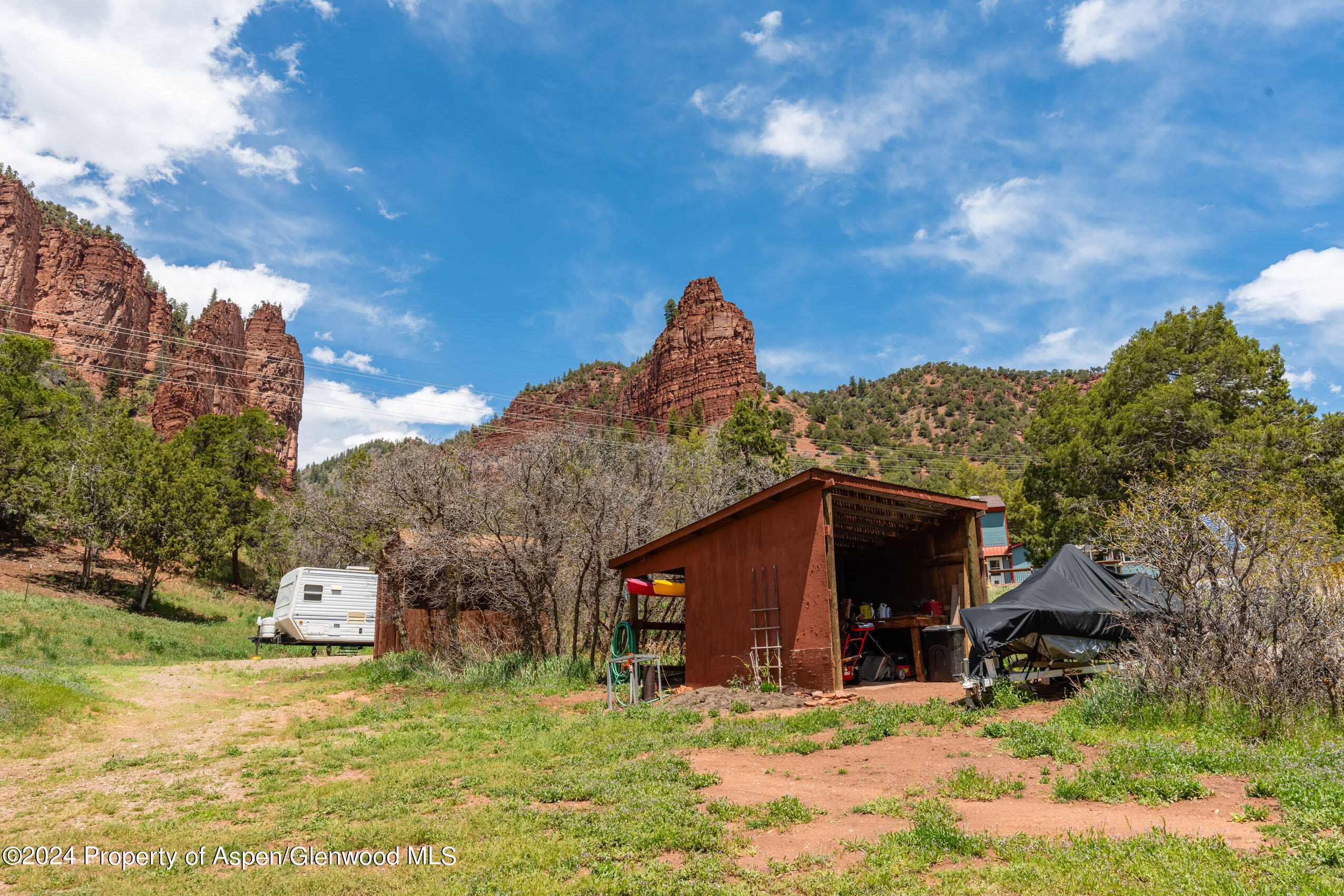 299 Knight Road Basalt, CO 81621 - Photo 39 of 48 a view of a house with a yard