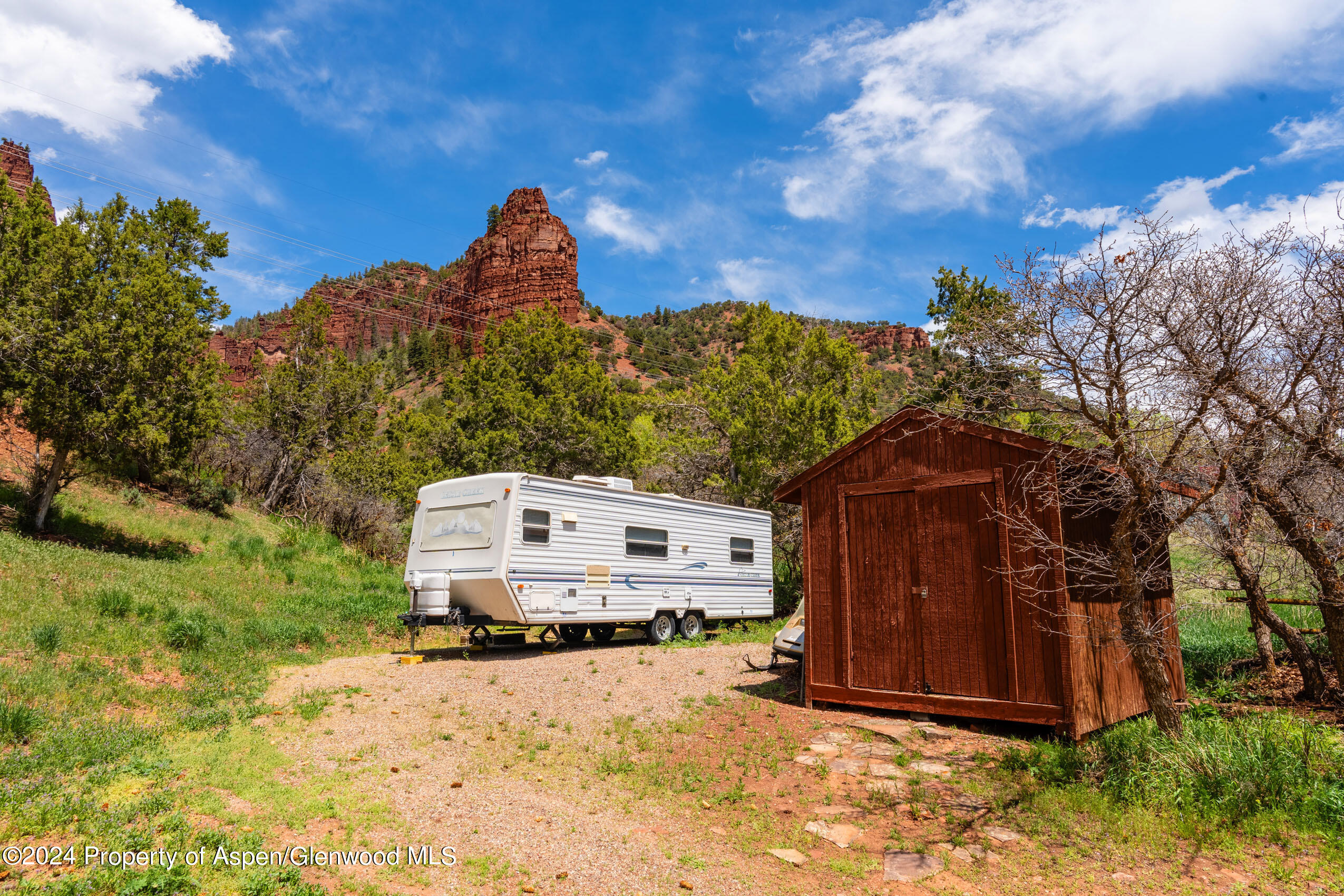 299 Knight Road Basalt, CO 81621 - Photo 40 of 48 a car parked in front of a house
