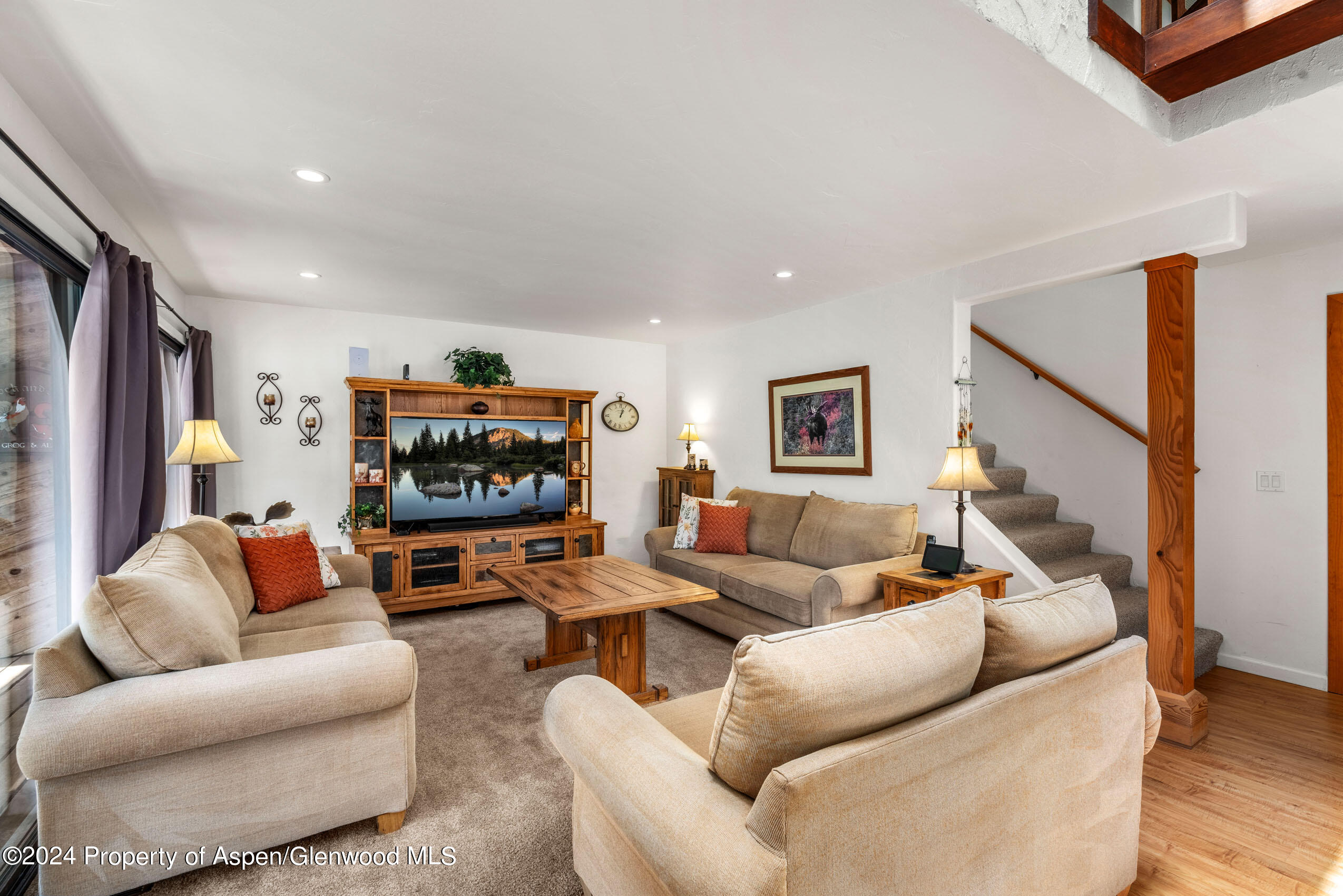 299 Knight Road Basalt, CO 81621 - Photo 8 of 48 a living room with furniture and a flat screen tv