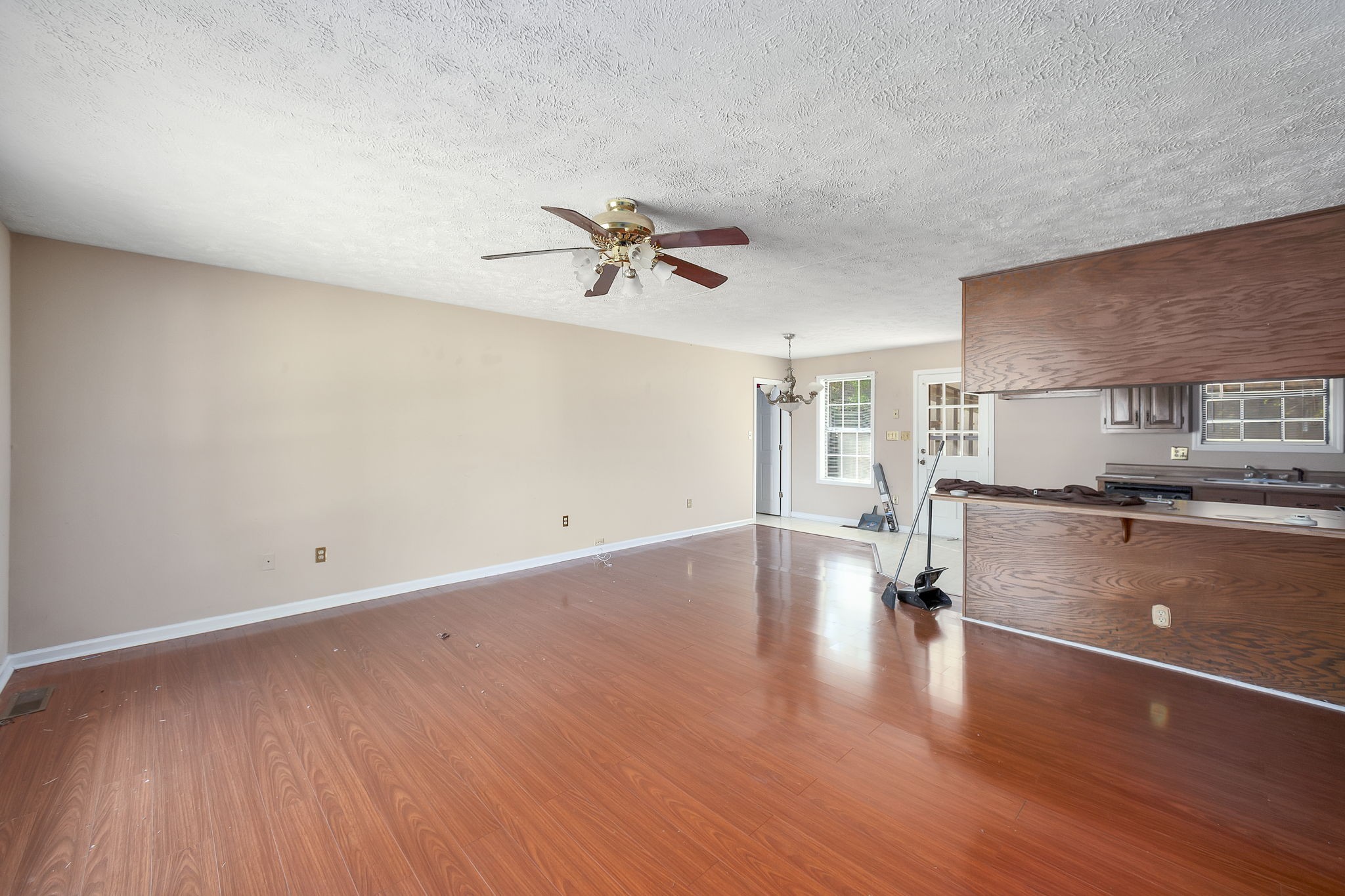 62 Beth Place Jackson, TN 38305 - Photo 4 of 6 wooden floor in an empty room with a window