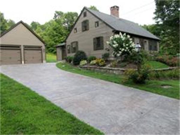 158 Ames Road Hampden, MA 01036 - Photo 1 of 30 a front view of a house with garden