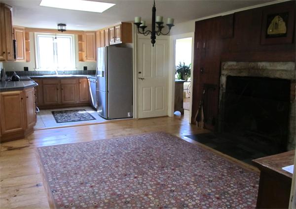 158 Ames Road Hampden, MA 01036 - Photo 14 of 30 a view of a refrigerator in kitchen and wooden floor