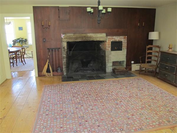 158 Ames Road Hampden, MA 01036 - Photo 15 of 30 an empty room with wooden floor and fireplace