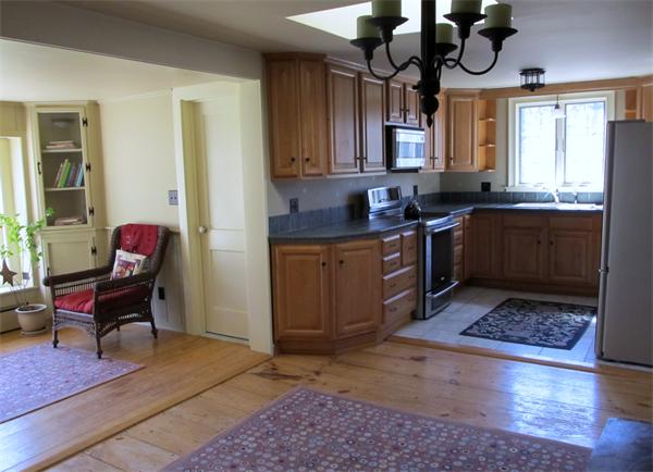 158 Ames Road Hampden, MA 01036 - Photo 16 of 30 a kitchen with stainless steel appliances granite countertop a stove a sink dishwasher and cabinets