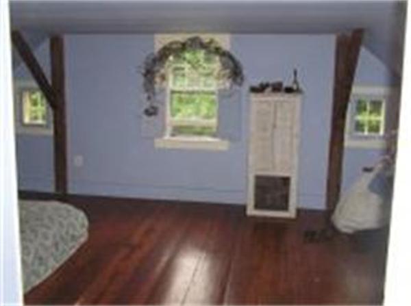 158 Ames Road Hampden, MA 01036 - Photo 18 of 30 a view of livingroom with hardwood floor and window