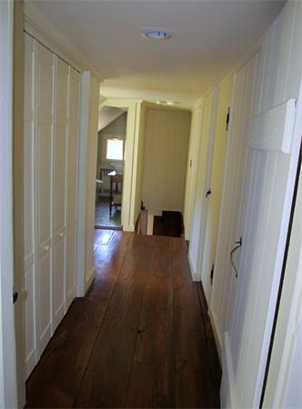 158 Ames Road Hampden, MA 01036 - Photo 22 of 30 a view of a hallway with wooden floor