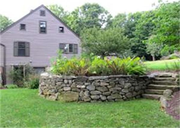 158 Ames Road Hampden, MA 01036 - Photo 3 of 30 a front view of a house with a garden