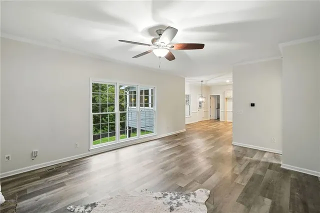 a view of entryway with wooden floor