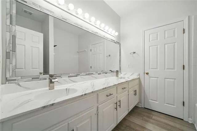 an aerial view of a house with a garden