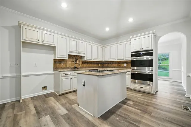 a view of a kitchen with cabinets