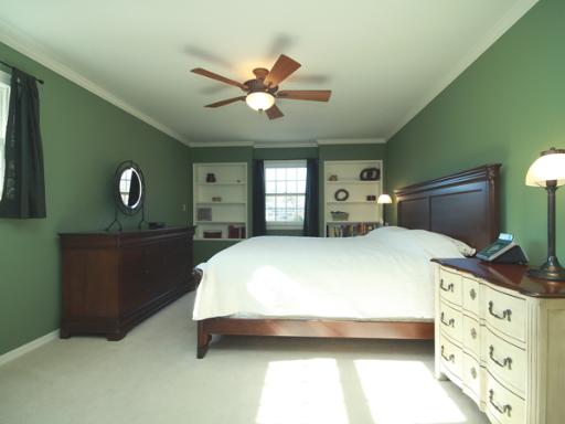 6N755 Murray Road St. Charles, IL 60175 - Photo 11 of 16 a bedroom with a bed and a chandelier