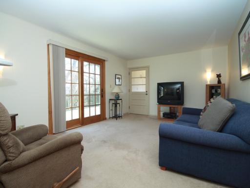 6N755 Murray Road St. Charles, IL 60175 - Photo 10 of 16 a living room with furniture and a flat screen tv
