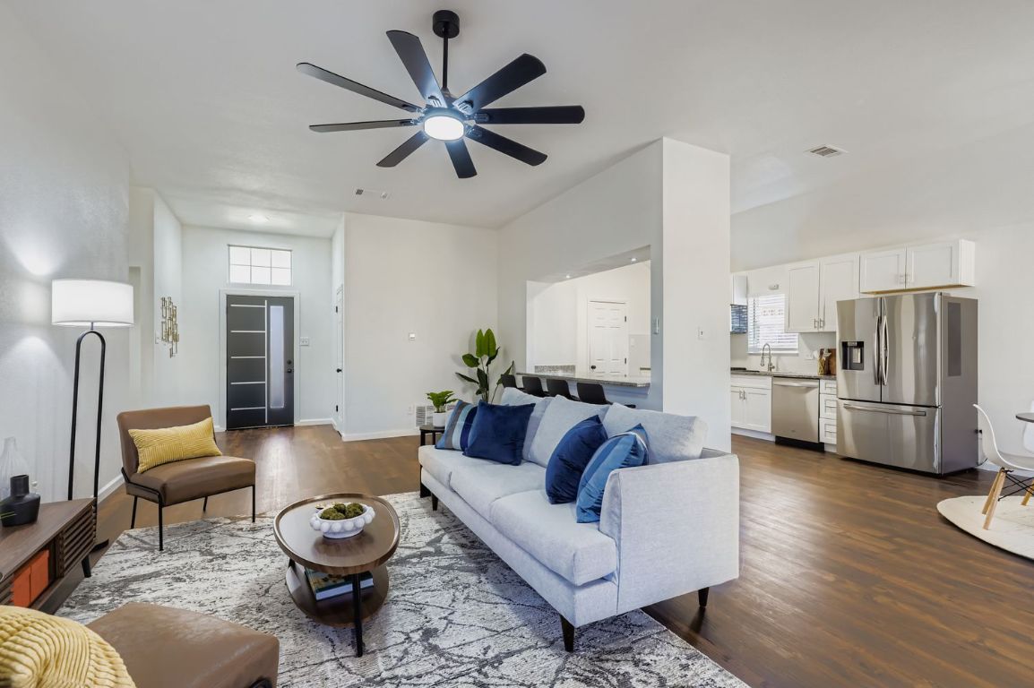 108 Susana Drive Georgetown, TX 78628 - Photo 5 of 26 a living room with furniture and a view of kitchen