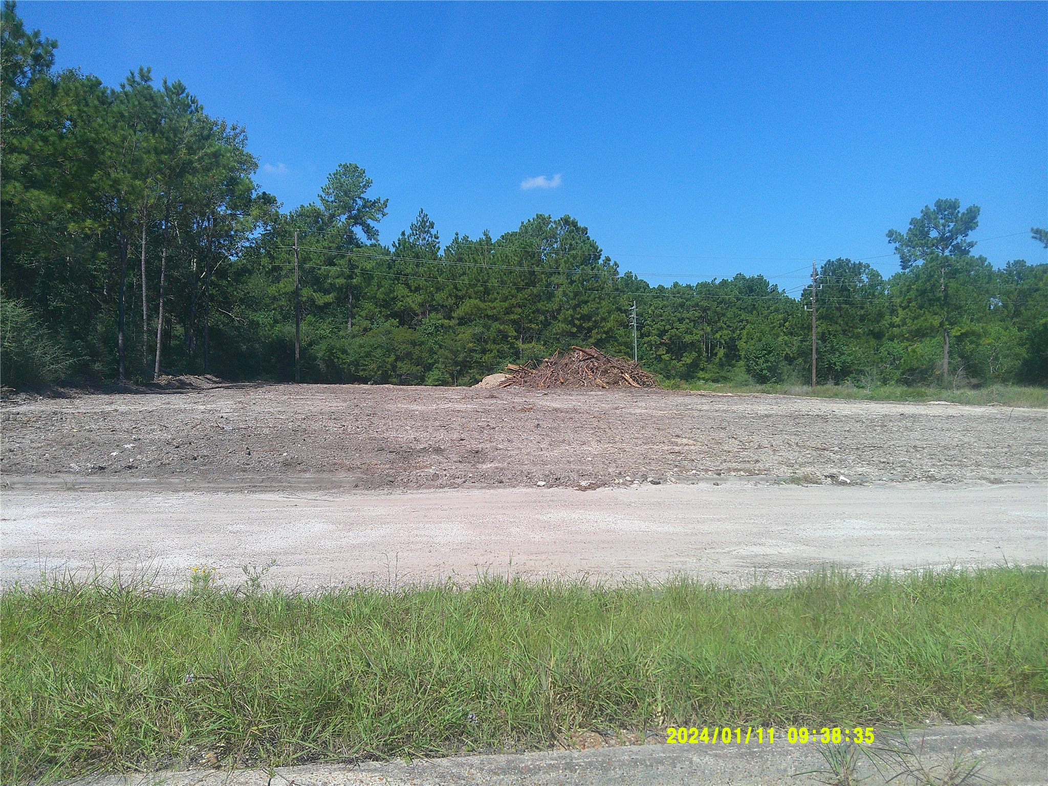 0 Baltic Drive Humble, TX 77346 - Photo 5 of 11 a view of a road with a field