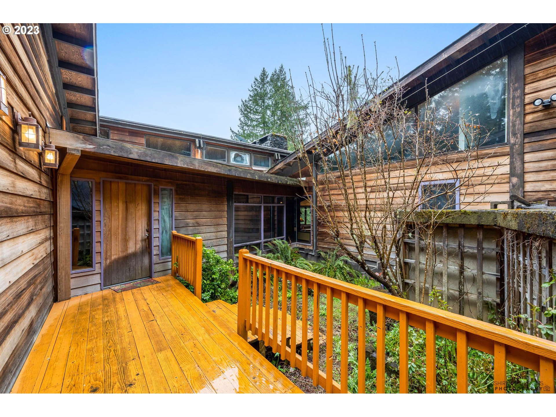 27313 Briggs Hill Road Eugene, OR 97405 - Photo 3 of 48 a view of a house with a balcony
