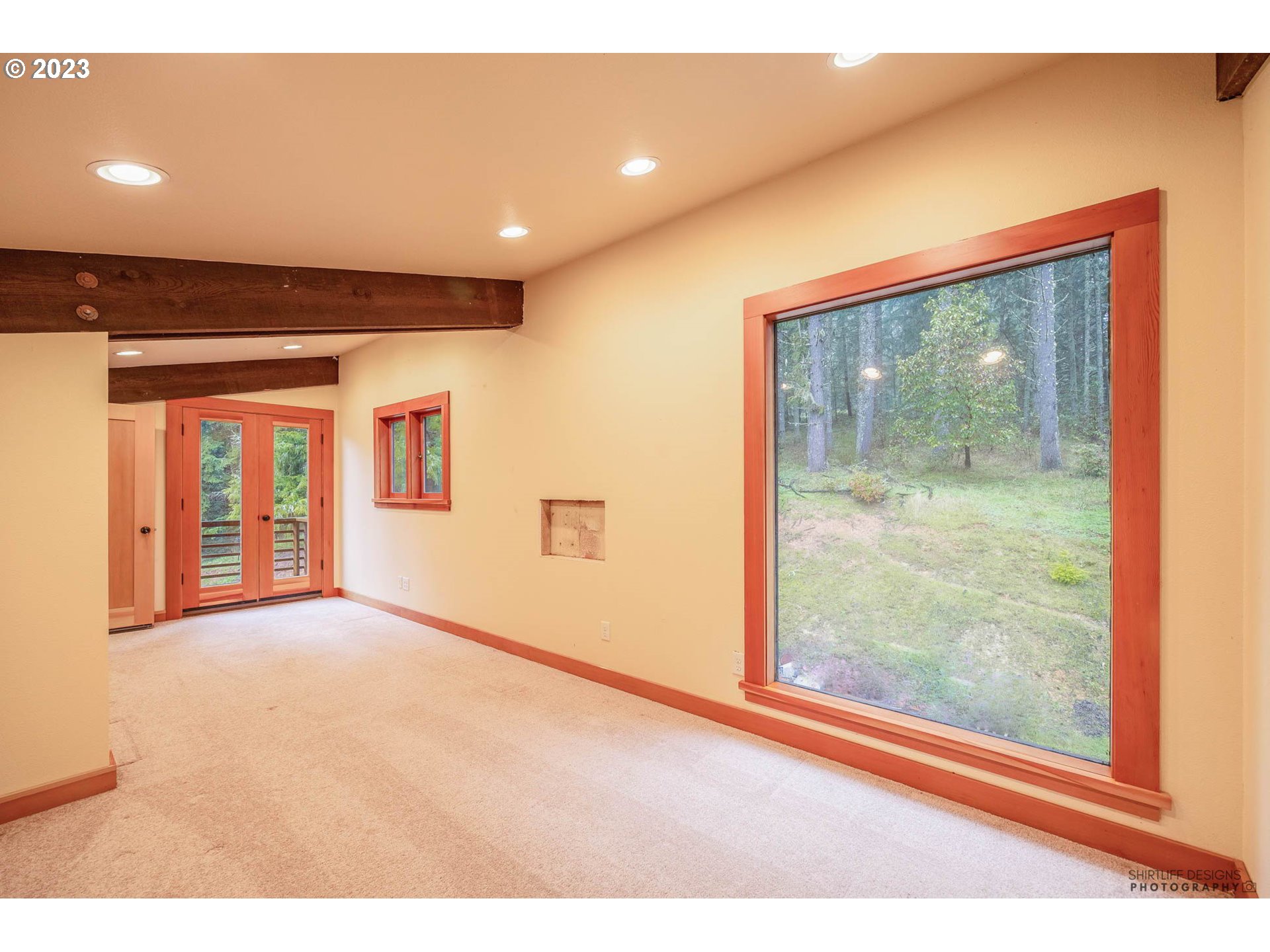 27313 Briggs Hill Road Eugene, OR 97405 - Photo 37 of 48 a view of an empty room with a window