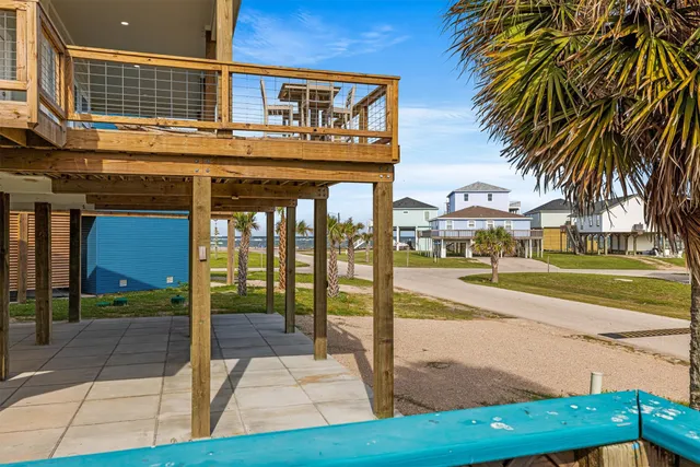 a view of a balcony with wooden floor