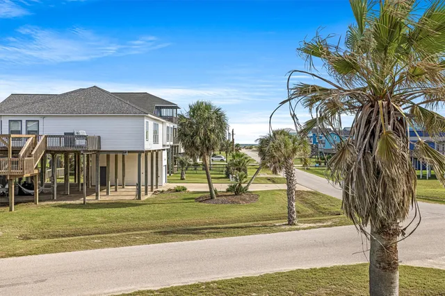 an aerial view of a house with a garden
