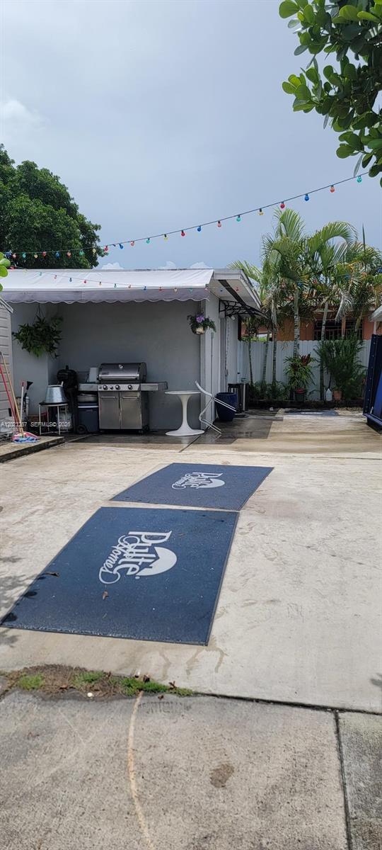 301 Southwest 36th Avenue Miami, FL 33135 - Photo 16 of 32 an outdoor view with patio
