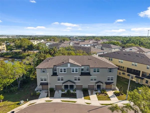 a aerial view of a house with a lake view