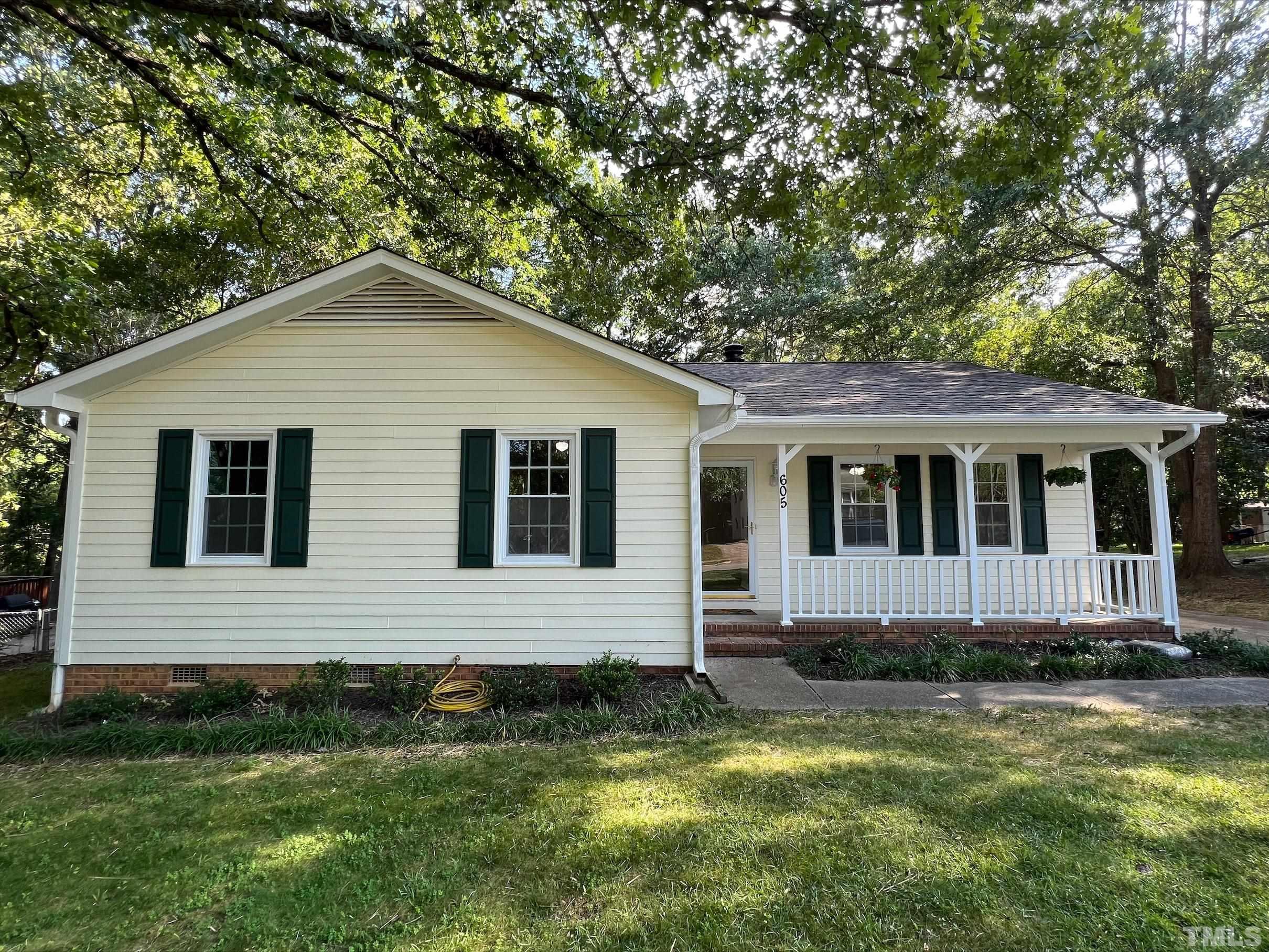 605 Sawmill Road Raleigh, NC 27615 - Photo 1 of 26 a front view of a house with a yard