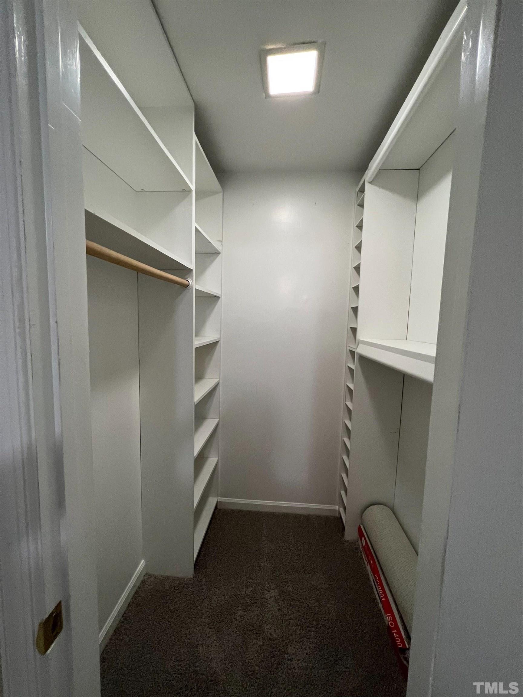 605 Sawmill Road Raleigh, NC 27615 - Photo 13 of 26 a view of an empty walk in closet