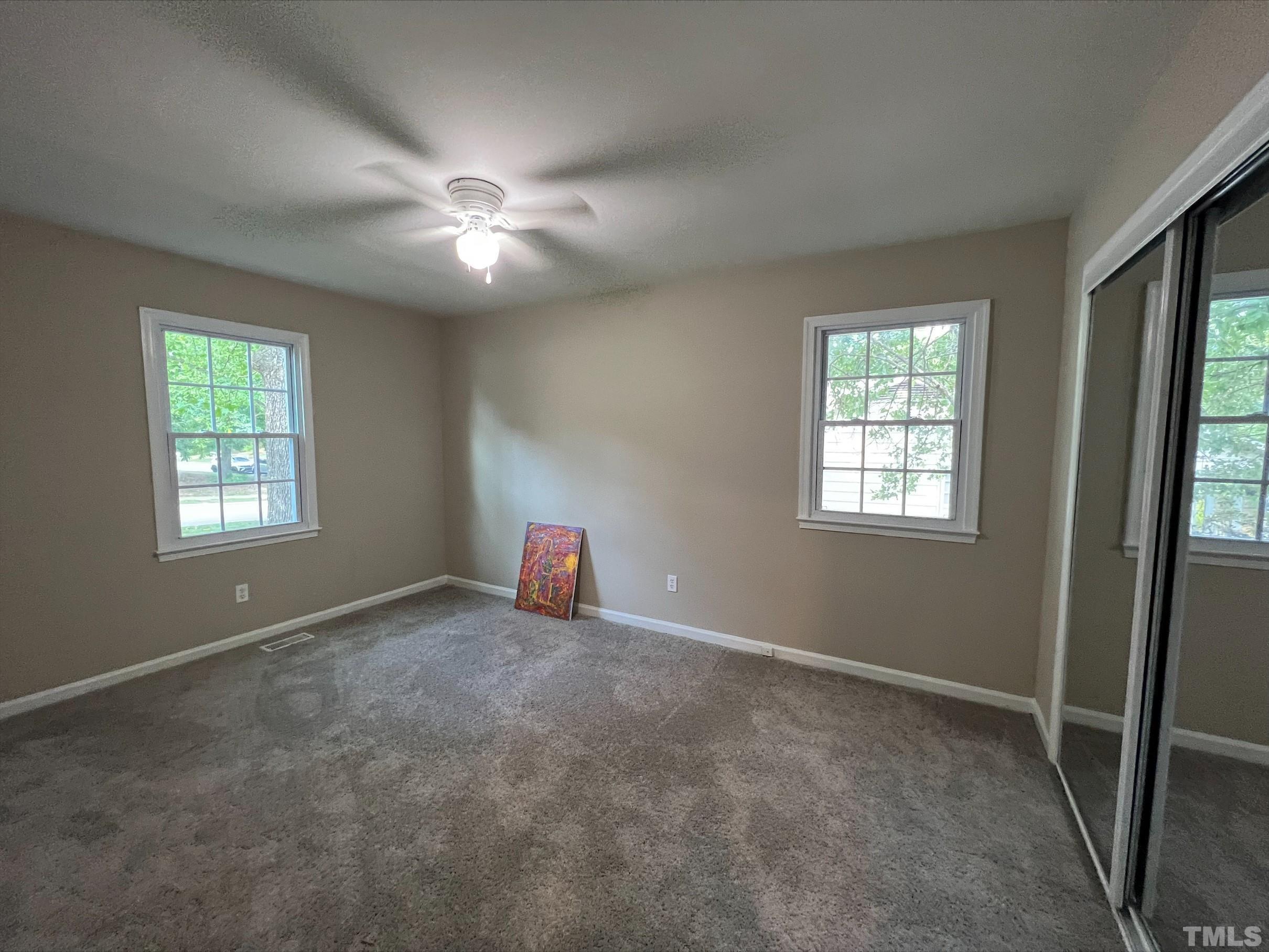 605 Sawmill Road Raleigh, NC 27615 - Photo 15 of 26 a view of an empty room with a window