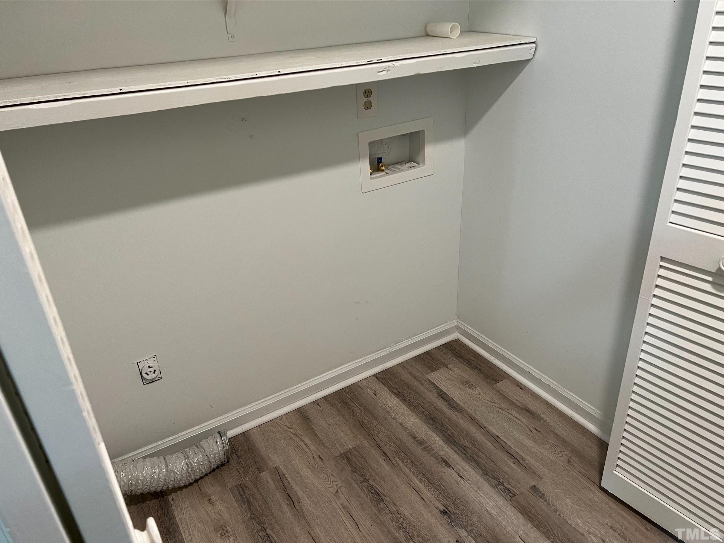 605 Sawmill Road Raleigh, NC 27615 - Photo 20 of 26 a view of a small space with wooden floor and a window