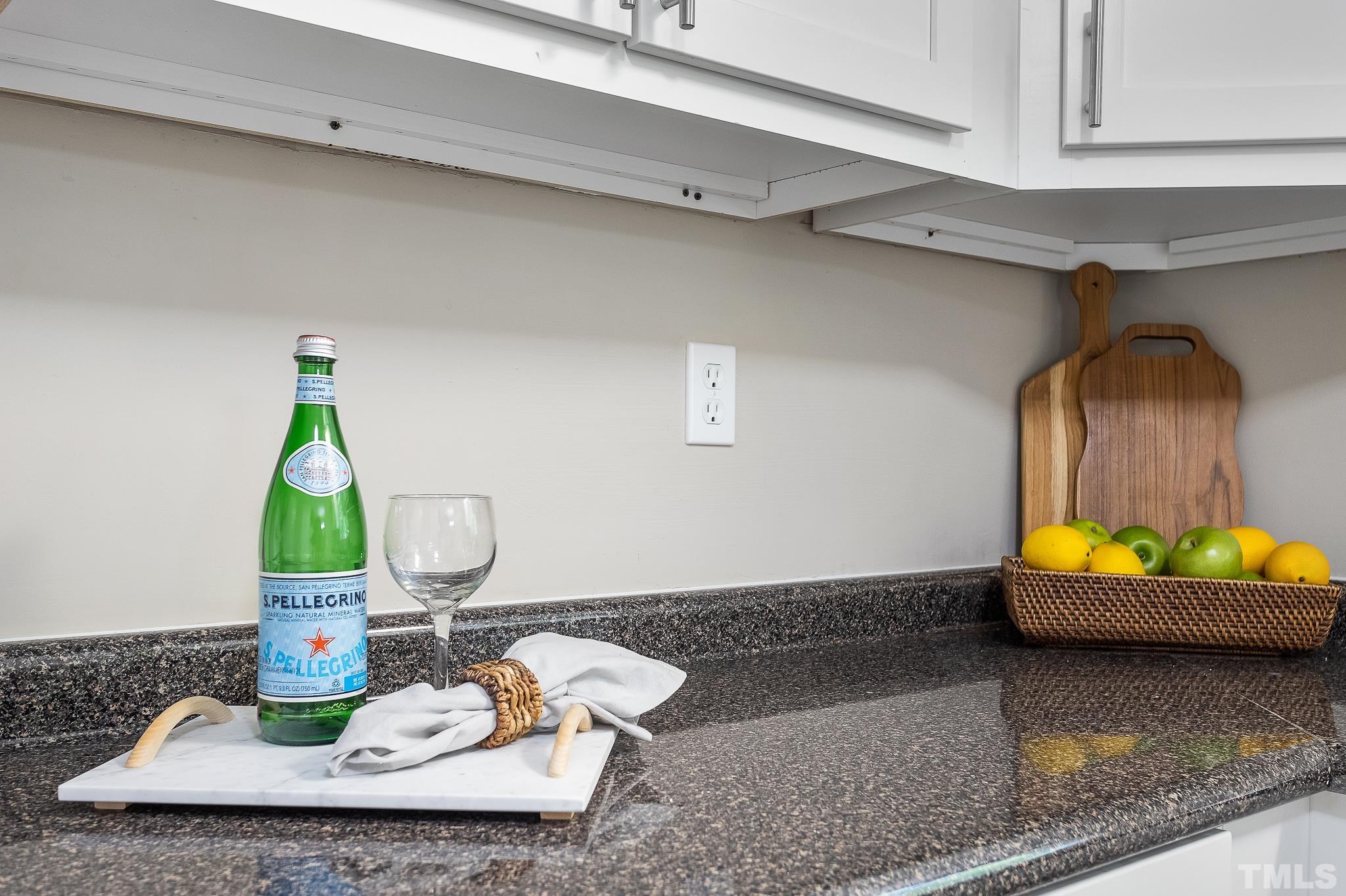 605 Sawmill Road Raleigh, NC 27615 - Photo 25 of 26 a kitchen with a sink and a stove