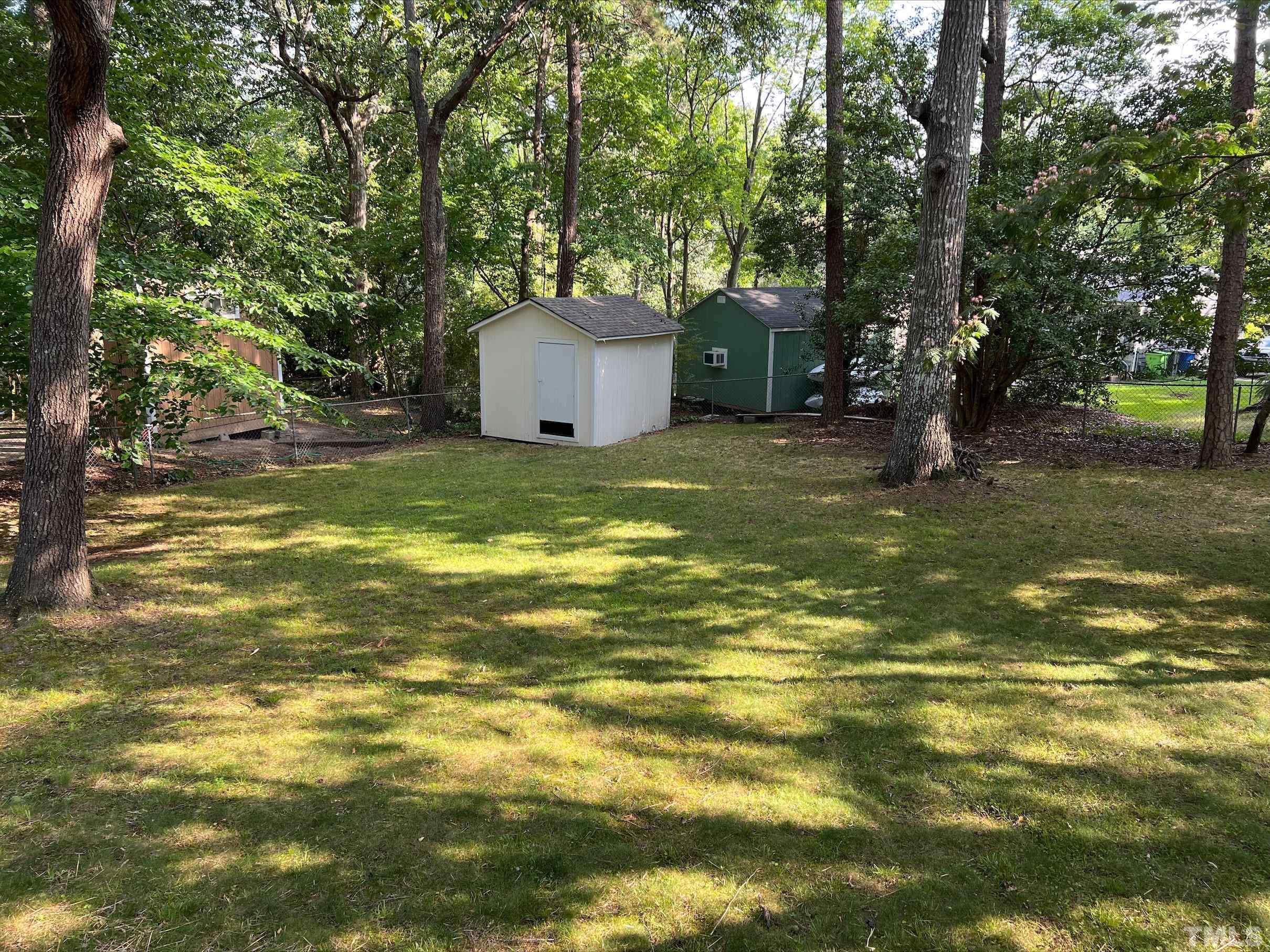 605 Sawmill Road Raleigh, NC 27615 - Photo 3 of 26 a view of a trees with basketball court