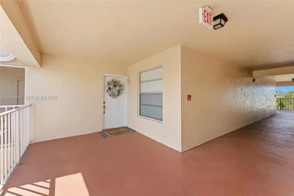 a view of a livingroom with wooden floor