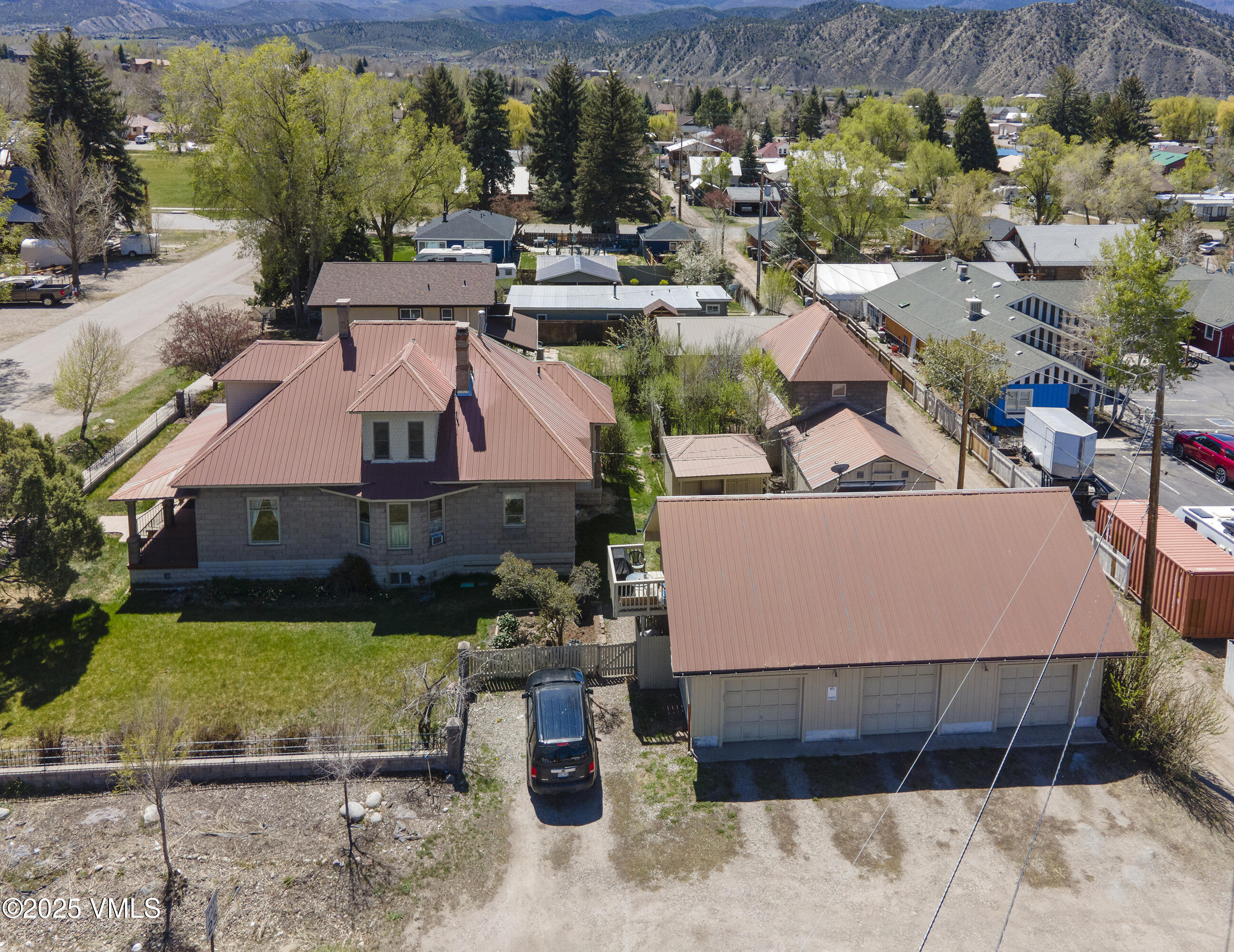 409 Washington Street Eagle, CO 81631 - Photo 28 of 28 an aerial view of a house with a garden and lake view